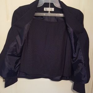 Navy blue pinstripe skirt suit